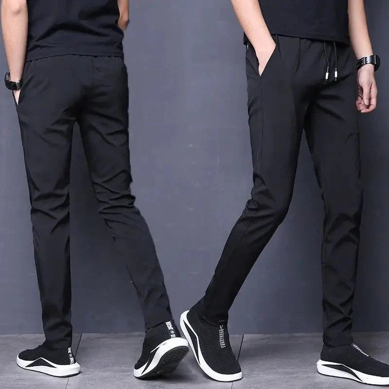 Calça Masculina Social Slim Elastic Pagliacci, feita em poliéster e algodão, com ajuste slim e fechamento flexível para um visual social elegante e confortável.
