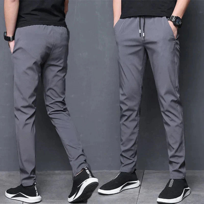 Calça Masculina Social Slim Elastic Pagliacci, feita em poliéster e algodão, com ajuste slim e fechamento flexível para um visual social elegante e confortável.