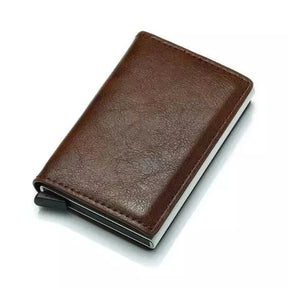 Carteira Masculina Pop Up Pagliacci, compacta e de design minimalista, com capacidade para até 7 cartões, feita em couro sintético e alumínio.

