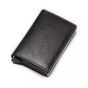 Carteira Masculina Pop Up Pagliacci, compacta e de design minimalista, com capacidade para até 7 cartões, feita em couro sintético e alumínio.

