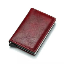 Carteira Masculina Pop Up Pagliacci, compacta e de design minimalista, com capacidade para até 7 cartões, feita em couro sintético e alumínio.

