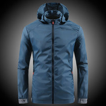 Jaqueta Corta Vento Speed PG300 com design moderno e tecido impermeável, ideal para proteger da chuva com leveza e estilo urbano.

